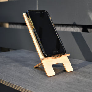 
                  
                    Wooden cell phone holder “D-Poser”
                  
                