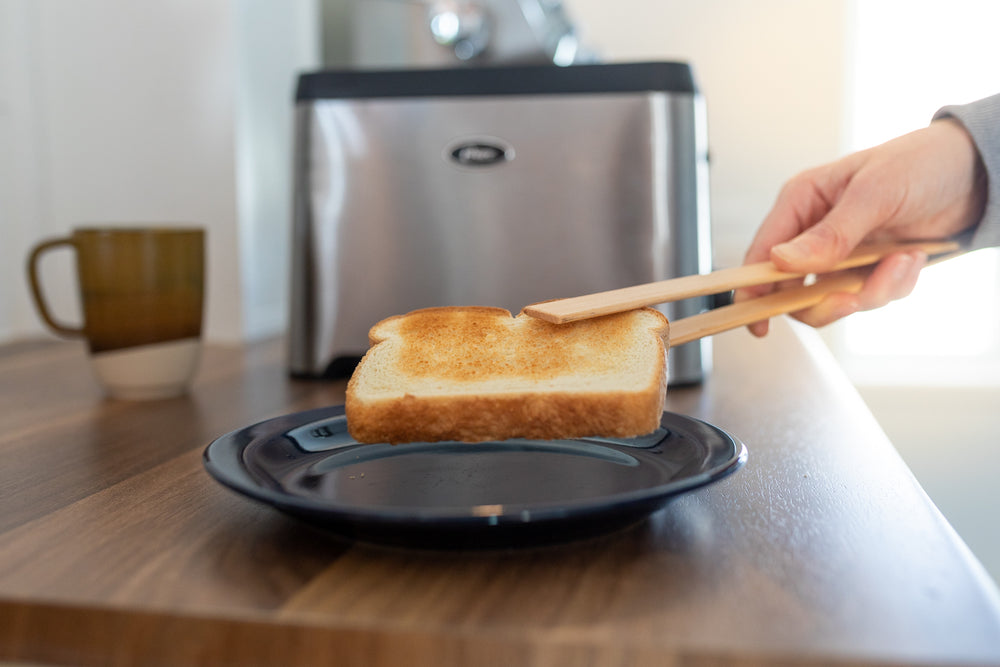Pince a toast magnetique pour grille - pain